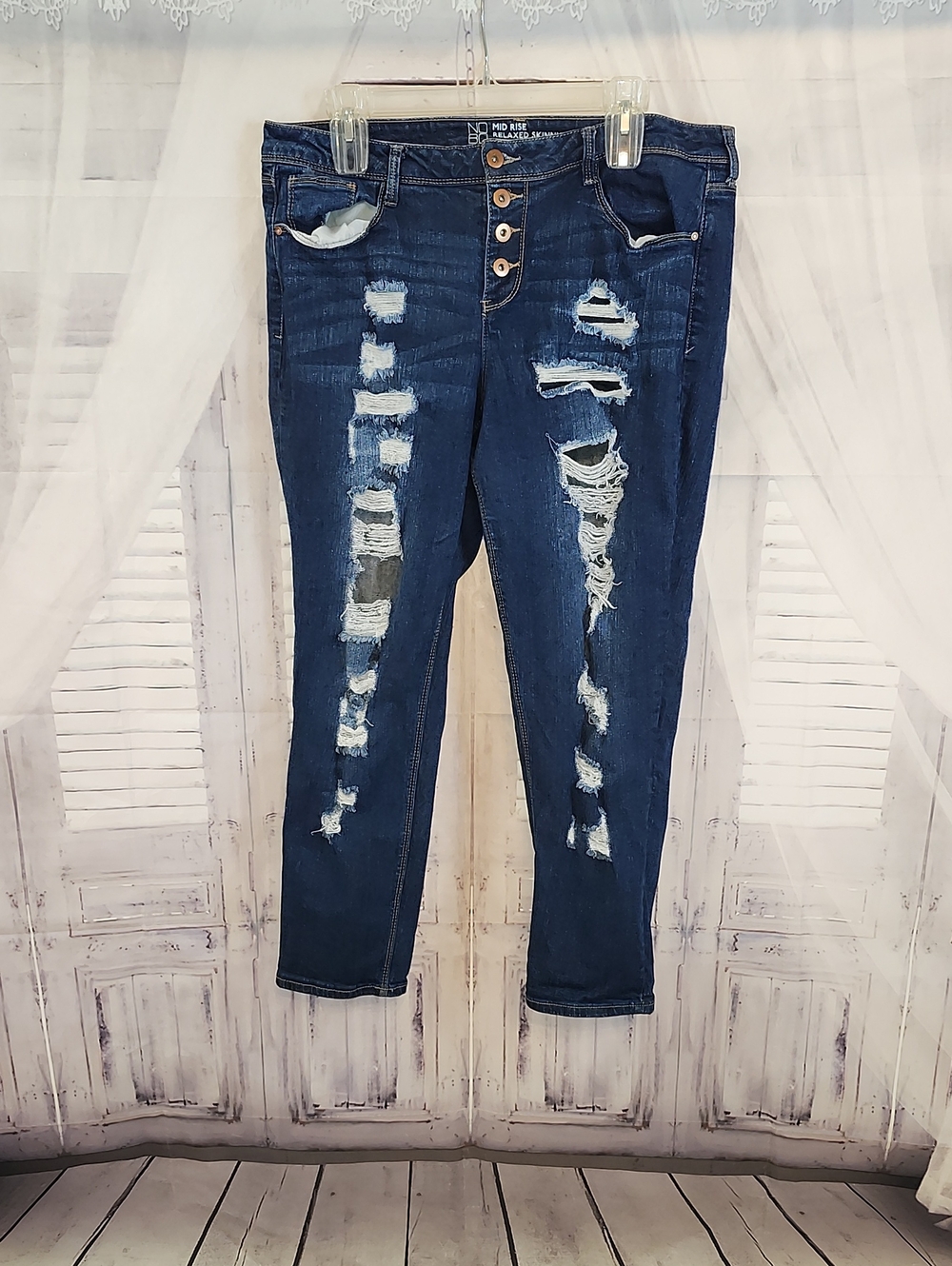 No Boundaries Distressed Mid Rise Relaxed Skinny Jeans